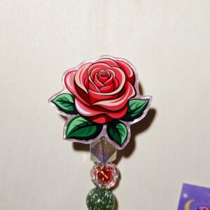 Como la Flor Badge Reel